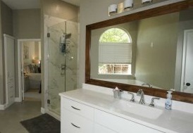 A newly remodeled bathroom with a walk-in shower