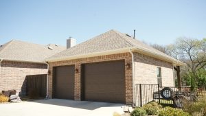 Detached garage addition with two doors.