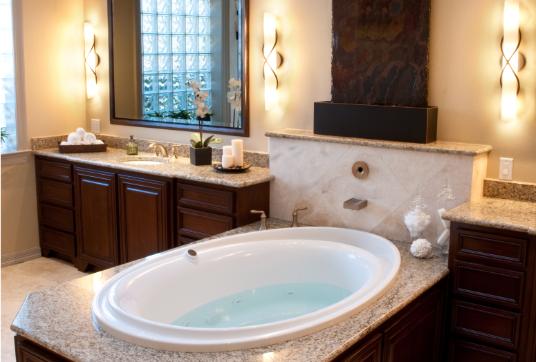 Elegant bathroom with large jacuzzi tub.