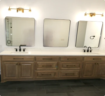 Double sink vanity with mirrors and lights