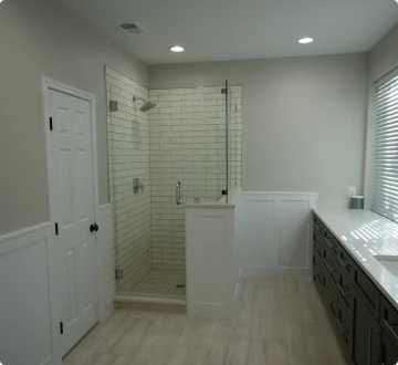 Modern bathroom with glass shower and vanity