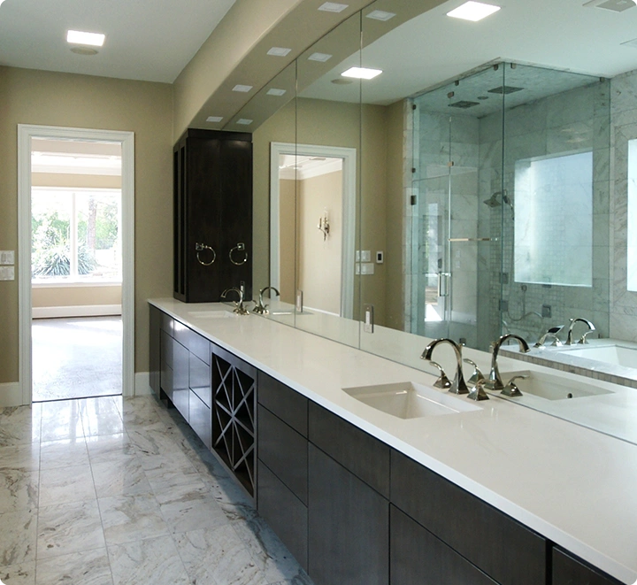 Modern bathroom with double sinks and large mirror